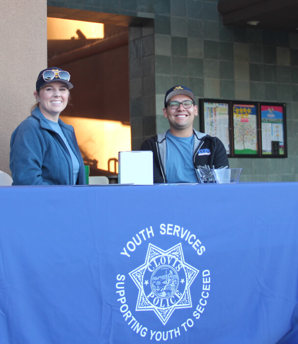 Clovis Animal Control officers taking donation money at golf tournament